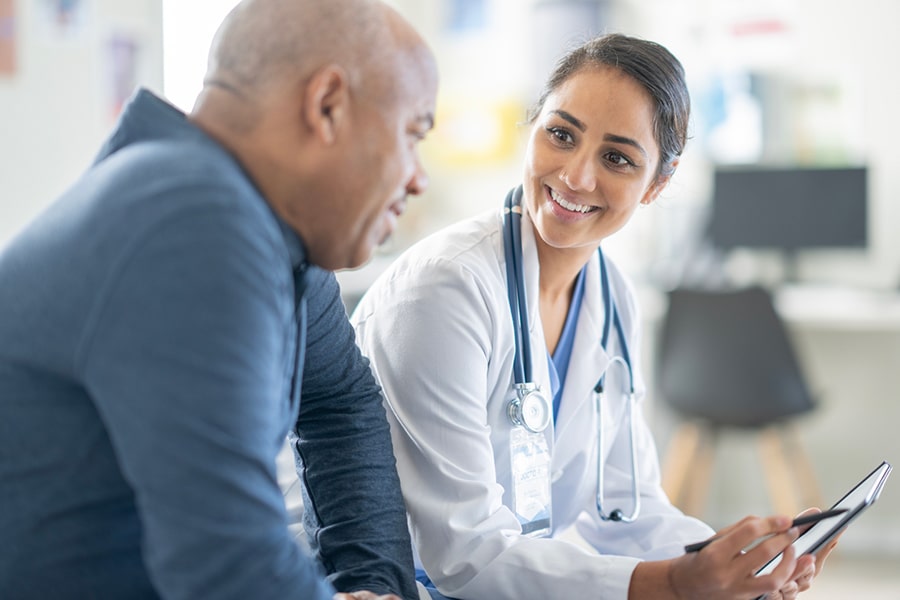 Woman Doctor with Patient