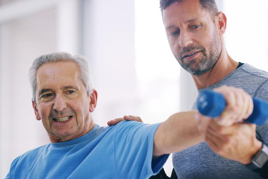 Physical Therapist with Older Man