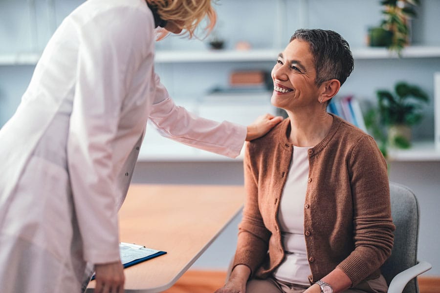 Doctor Telling Patient About Regenerative Medicine near Fraser MI