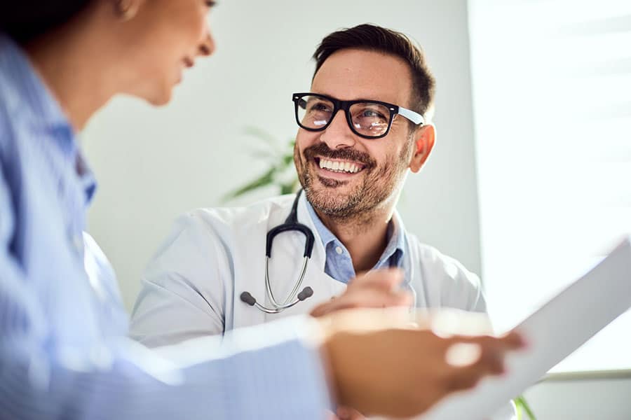 Doctor Smiling About Regenerative Medicine near Shelby Township, MI